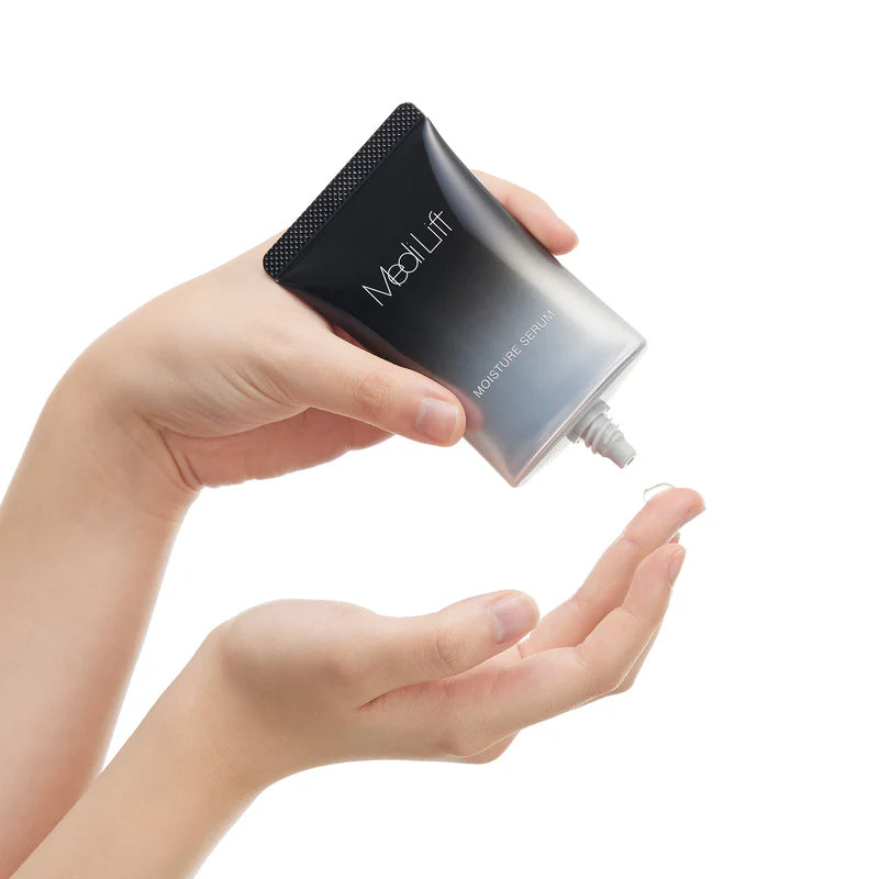 Medi Lift Moisture Serum bottle held in hand, serum being dispensed into another hand.