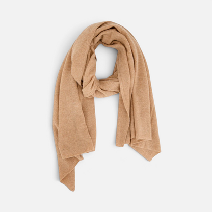 Shop Rescue Spa beige cashmere travel wrap, a soft and versatile unisex knit scarf for travel or evening wear.