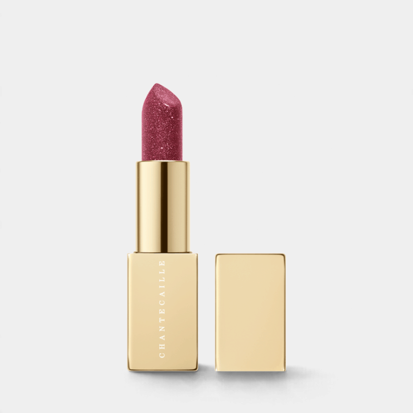 Shop Rescue Spa Lip Cristal in Aventurine, a glittering raspberry pearl-infused lipstick in a gold metallic case.