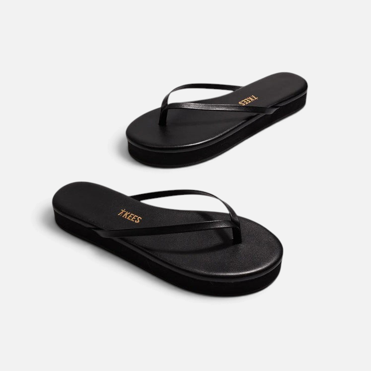 Shop Rescue Spa Lily Platforms in sable black leather with a 2.5 cm cushioned platform sole and thong strap design.
