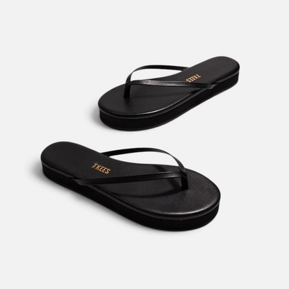 Shop Rescue Spa Lily Platforms in sable black leather with a 2.5 cm cushioned platform sole and thong strap design.