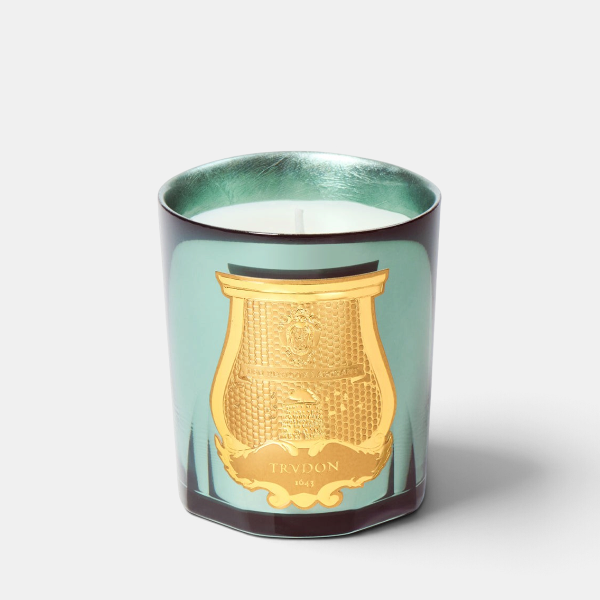 Shop Rescue Spa Trudon Fir candle in a celadon lacquered glass with silver leaf interior and gold emblem