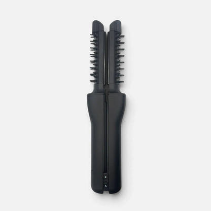 Shop Rescue Spa YA-MAN SPA STYLER Cordless Volume + Smooth heated hair brush in matte black with a folding design.