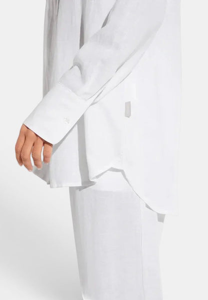 Side view of Zimmerli Button Front Shirt Long Sleeve in white worn on model, showing fit, sleeve length, and shirt drape from profile angle.