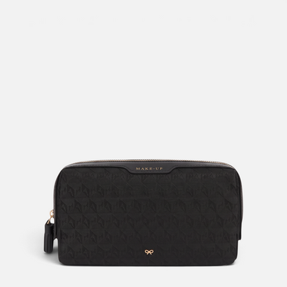 Shop Rescue Spa black logo small make-up pouch with patent leather trim and gold bow detail