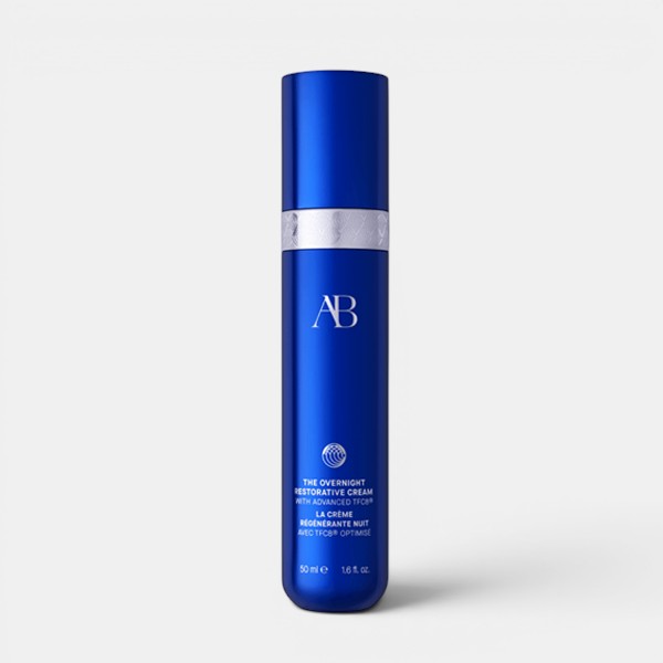 Augustinus Bader The Overnight Restorative Cream unboxed and centered on a grey background with a soft shadow underneath the jar.