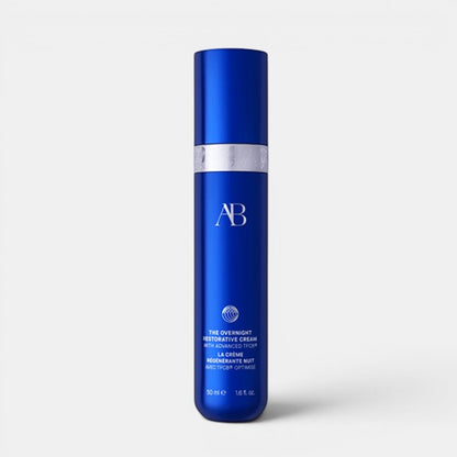 Augustinus Bader The Overnight Restorative Cream unboxed and centered on a grey background with a soft shadow underneath the jar.