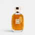 Atelier des Ors Nuda Vanilla perfume bottle centered front view white background amber vanilla fragrance gold cap luxury niche perfume