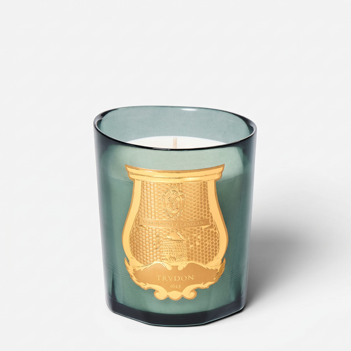 Shop Rescue Spa Figuerie candle in a green glass vessel with a gold embossed Trudon crest label