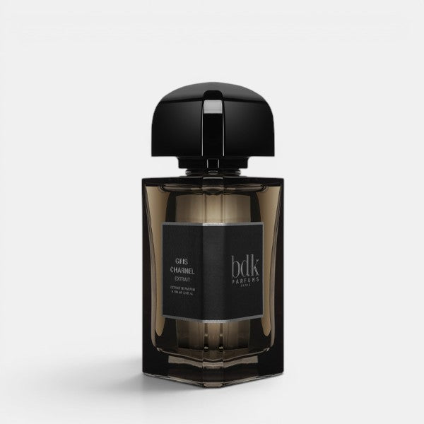 Front-facing product photo of BDK Parfums Gris Charnel Extrait on a clean white background, showcasing the perfume bottle’s dark, minimalist glass design.