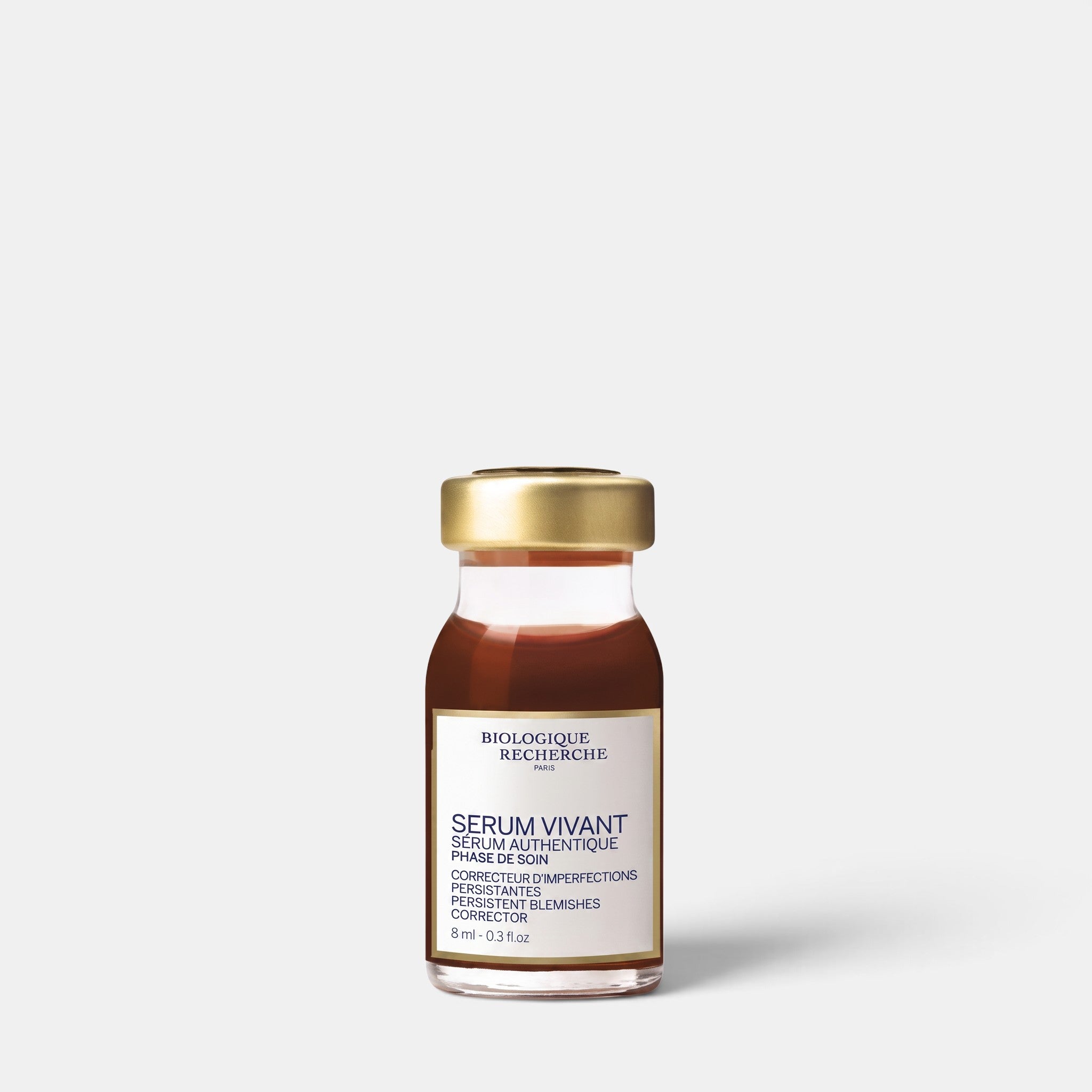 A small glass bottle of Biologique Recherche Serum Vivant serum with a gold cap and cream-colored label, centered on a light gray background.