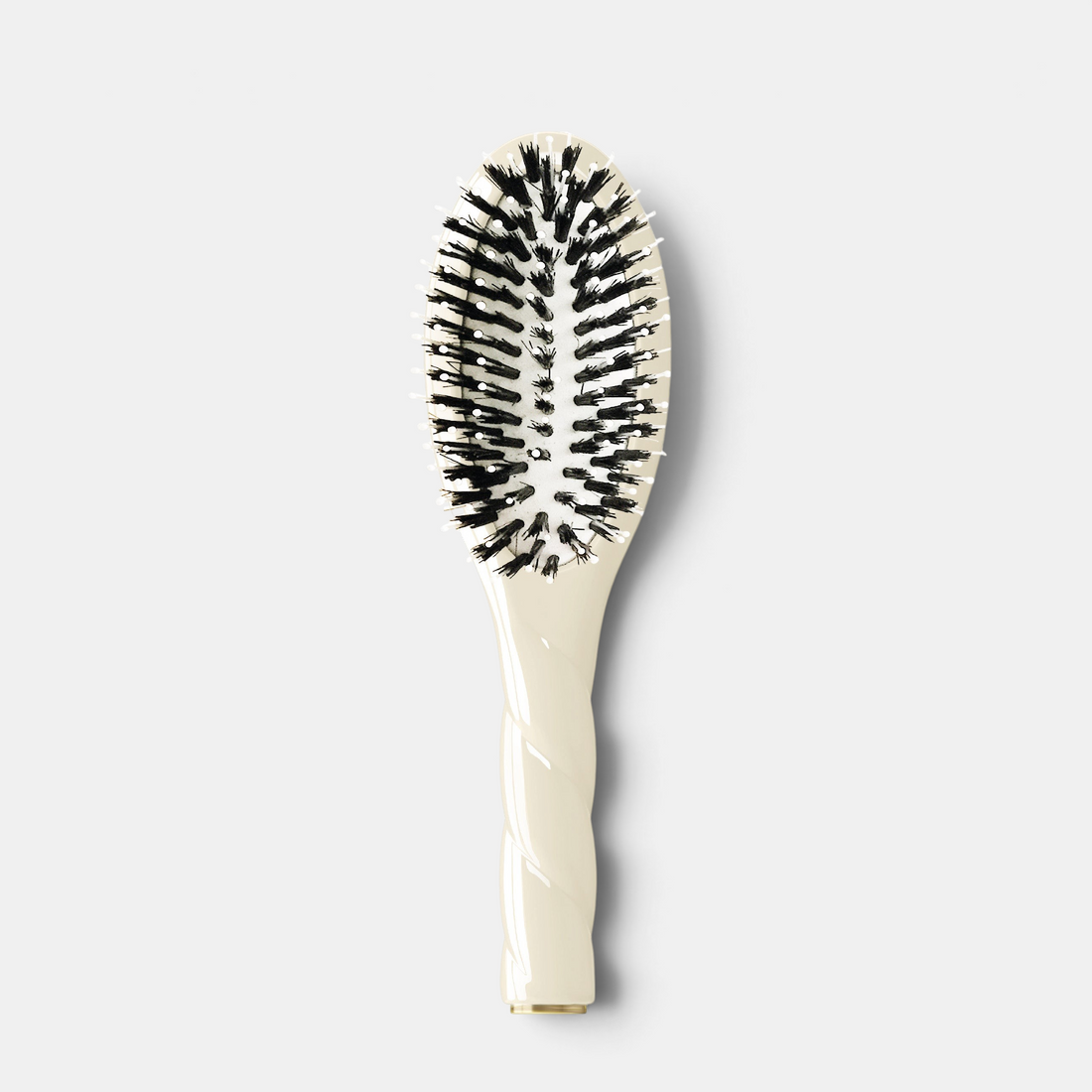 Shop Rescue Spa N.03 Petite Essential Soft Hair Brush in creamy white with boar bristles and a twisted handle.