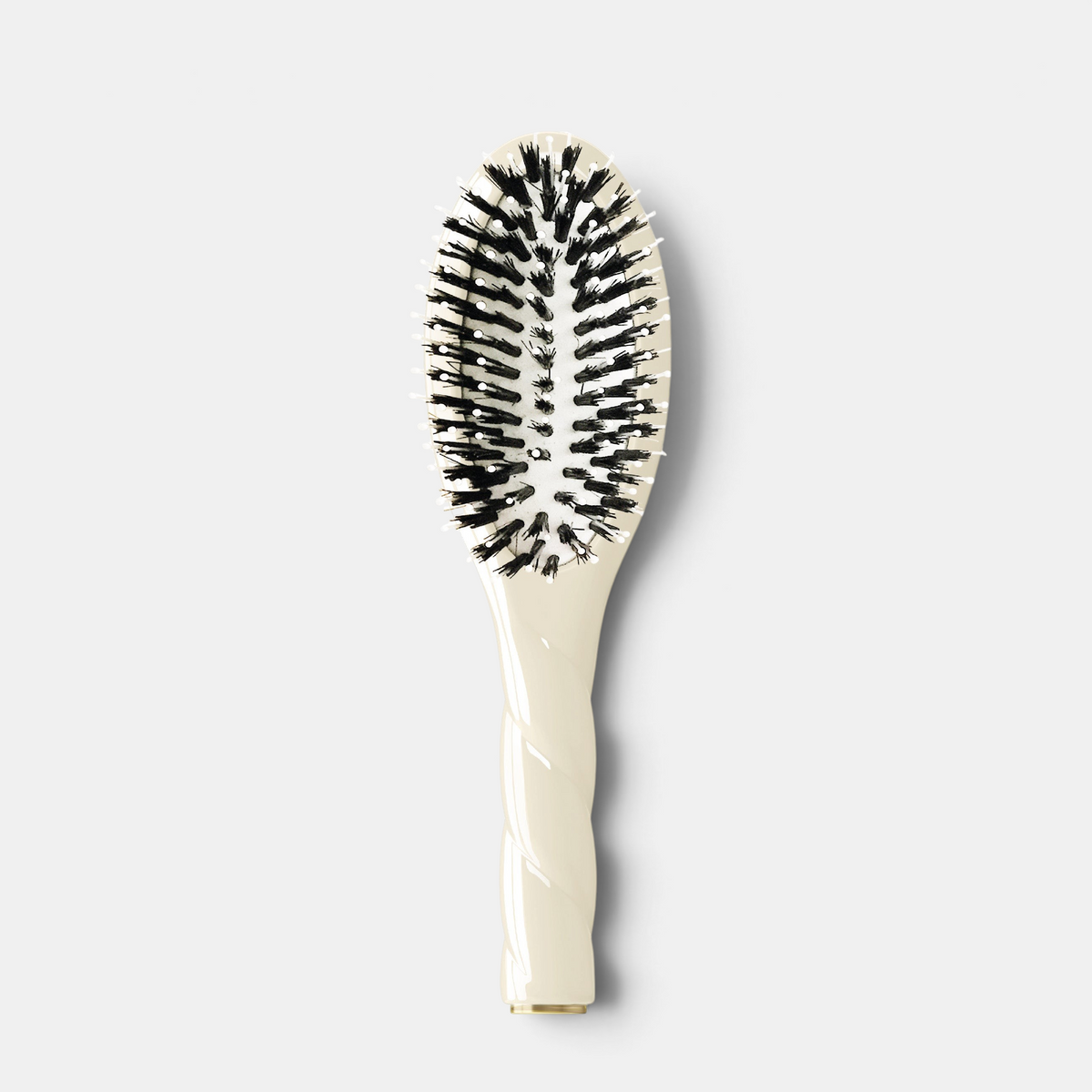 Shop Rescue Spa N.03 Petite Essential Soft Hair Brush in creamy white with boar bristles and a twisted handle.