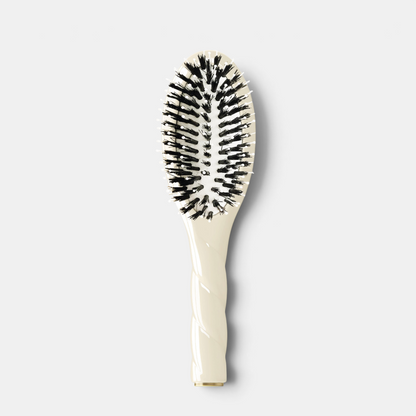 Shop Rescue Spa N.03 Petite Essential Soft Hair Brush in creamy white with boar bristles and a twisted handle.