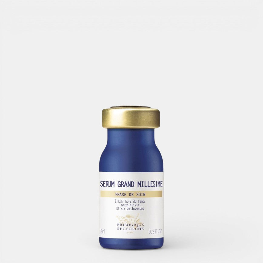 Biologique Recherche Sérum Grand Millésime (0.3 fl.oz) – A luxurious blue serum bottle with a gold cap, showcased against a white background.