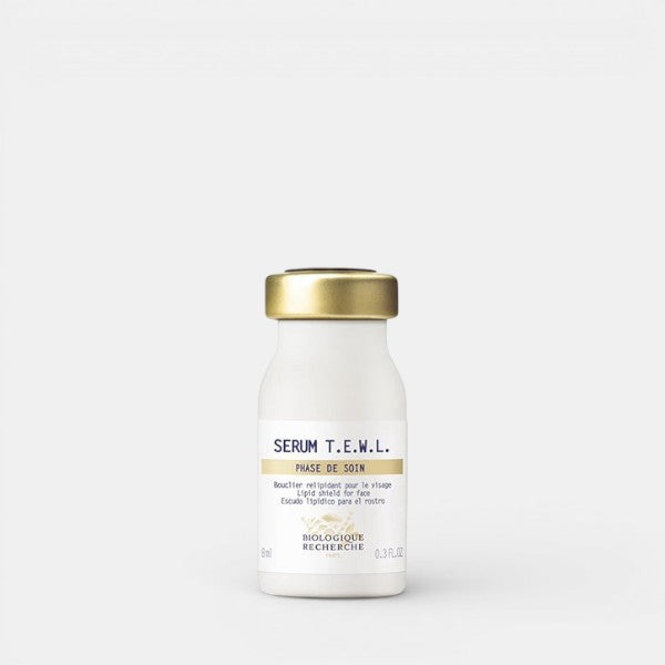 Biologique Recherche Sérum T.E.W.L. 0.3 fl.oz – A smaller white serum bottle with a branded white label featuring dark blue lettering and gold accents, shown upright on a white background. This intensive treatment helps prevent moisture loss and restore comfort to dry, dehydrated, or compromised skin.
