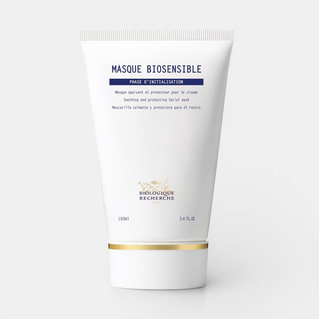 Biologique Recherche Masque Biosensible in a white squeezable tube with a gold cap, labeled with the Biologique Recherche logo in black and blue text, displayed upright on a white background. A soothing and moisturizing face mask formulated for sensitive and irritated skin.