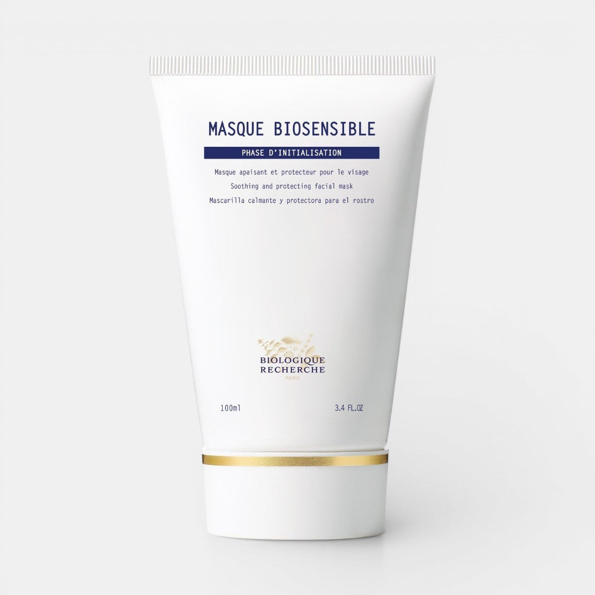 Biologique Recherche Masque Biosensible in a white squeezable tube with a gold cap, labeled with the Biologique Recherche logo in black and blue text, displayed upright on a white background. A soothing and moisturizing face mask formulated for sensitive and irritated skin.