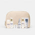 Set of Biologique Recherche Travel Essentials skincare products in a beige travel bag on a white background
