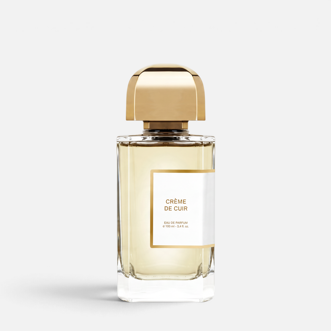 Shop Rescue Spa Creme De Cuir eau de parfum in a clear glass bottle with a gold cap and white label