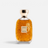 Shop Rescue Spa Atelier Nuda Veritas perfume bottle with gold flakes and seahorse emblem on a white background