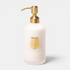 Shop Rescue Spa Carmen scented hand lotion in a white ribbed glass bottle with a gold pump and Trudon emblem