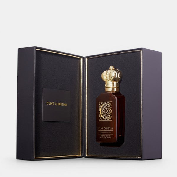 Open presentation box of Clive Christian C Woody Leather Parfum on a clean background, showing interior packaging and perfume bottle inside.
