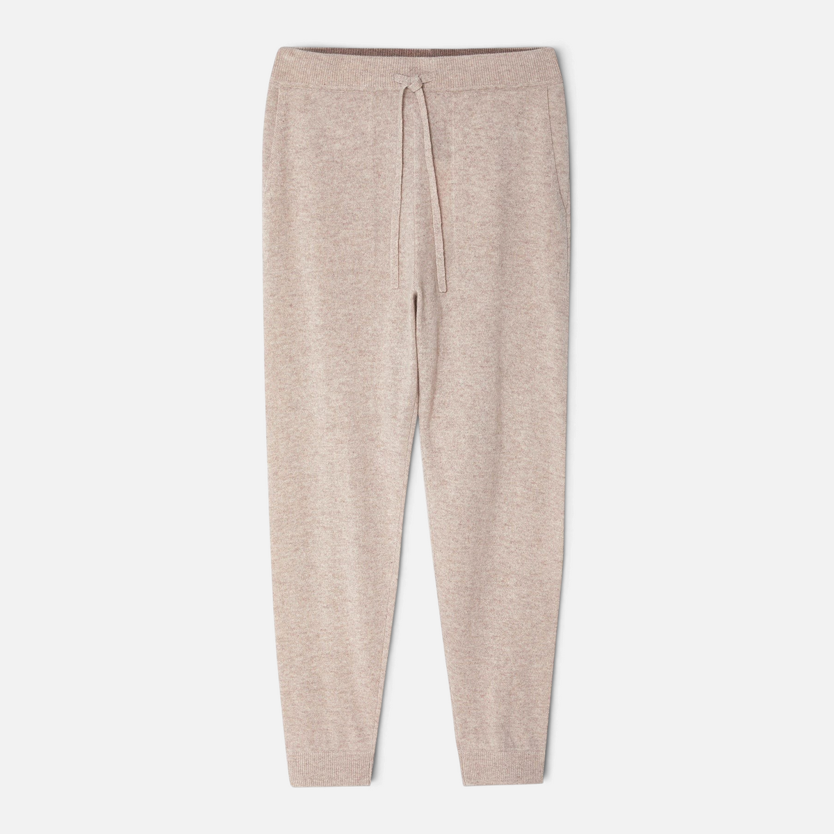 Shop Rescue Spa beige cashmere joggers featuring a relaxed fit, drawstring waistband, and tapered ribbed cuffs.