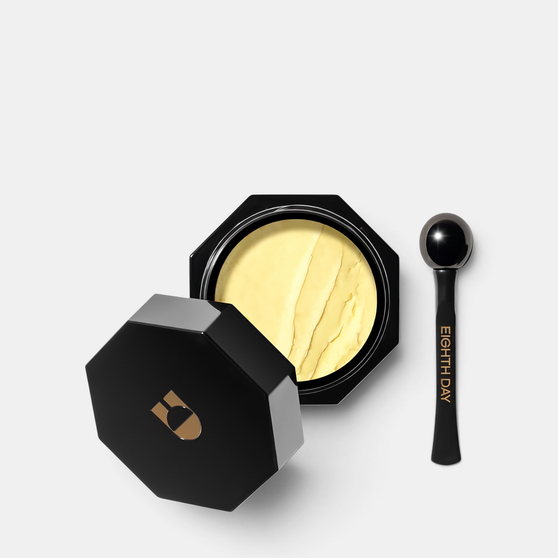 Shop Rescue Spa The Overnight Eye Cream Treatment in a black octagonal jar with a matching applicator tool.