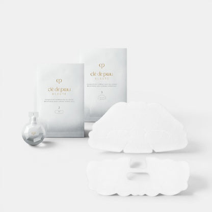 Clé de Peau sheet mask unfolded showing full facial contour fit