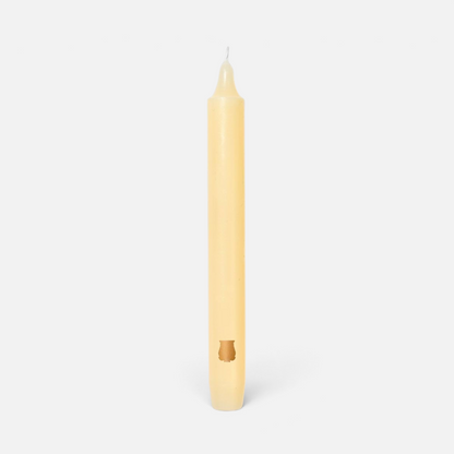 Shop Rescue Spa Madeleine taper candle in cream wax with a small embossed logo detail on a plain white background.