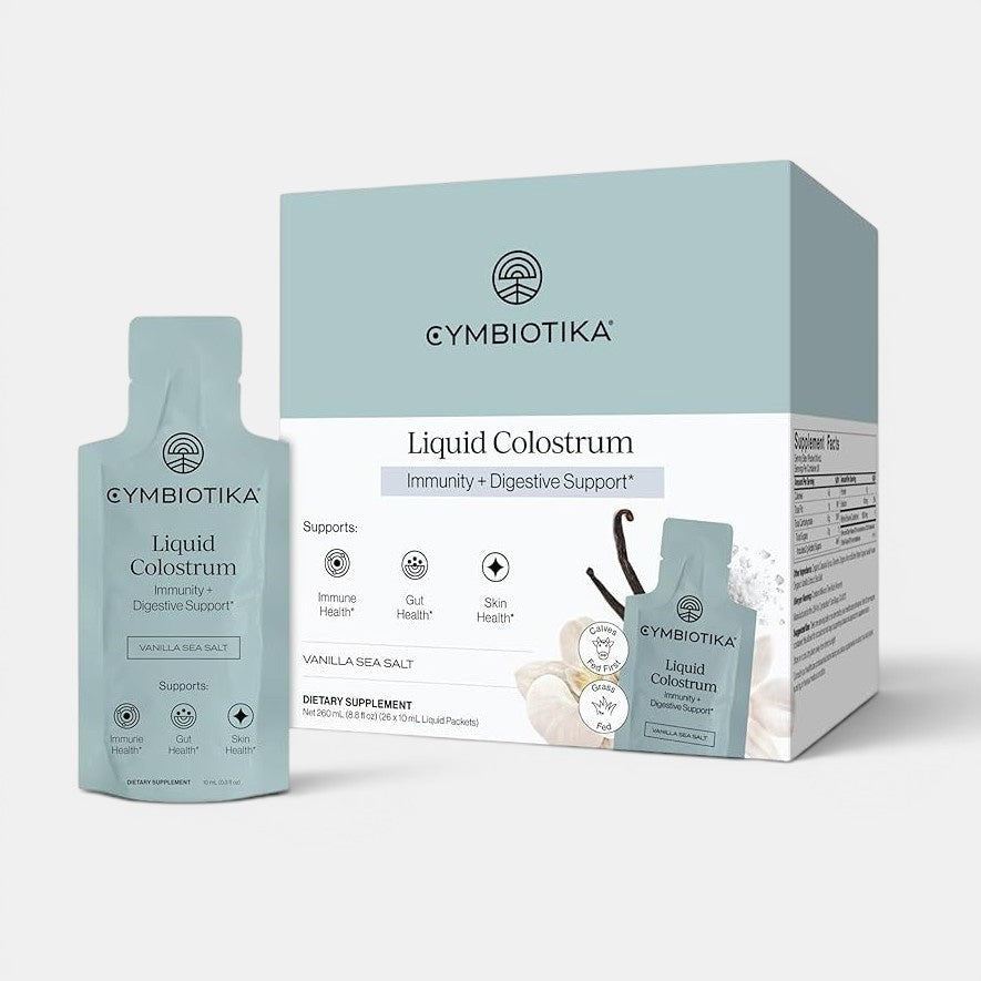 Cymbiotika Liquid Colostrum position upright with a white background. Liquid Colostrum may support hair, skin, nails, a healthy gut lining, and a healthy immune system.