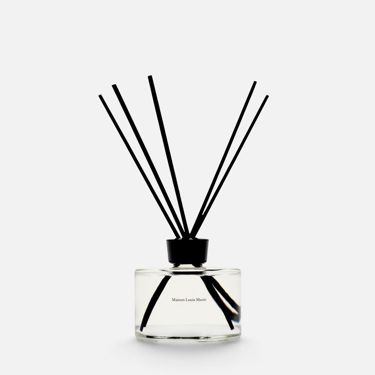 Shop Rescue Spa No. 14 Icila reed diffuser in a clear glass bottle with black reeds for home fragrance