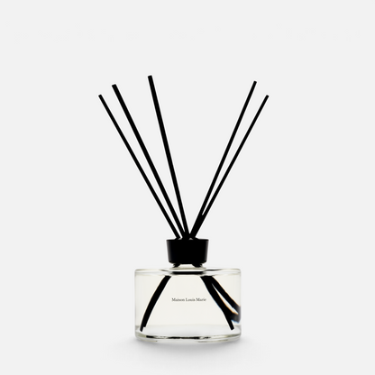 Shop Rescue Spa No. 14 Icila reed diffuser in a clear glass bottle with black reeds for home fragrance