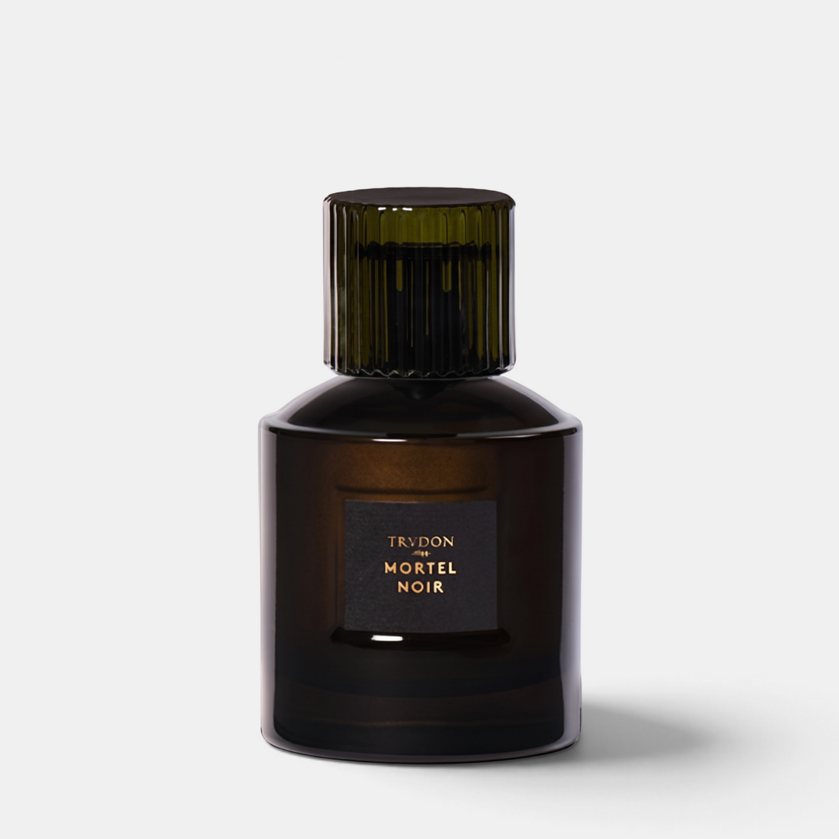 Shop Rescue Spa Mortel Noir Eau De Parfum in a dark glass bottle with a ribbed cap against a neutral background.