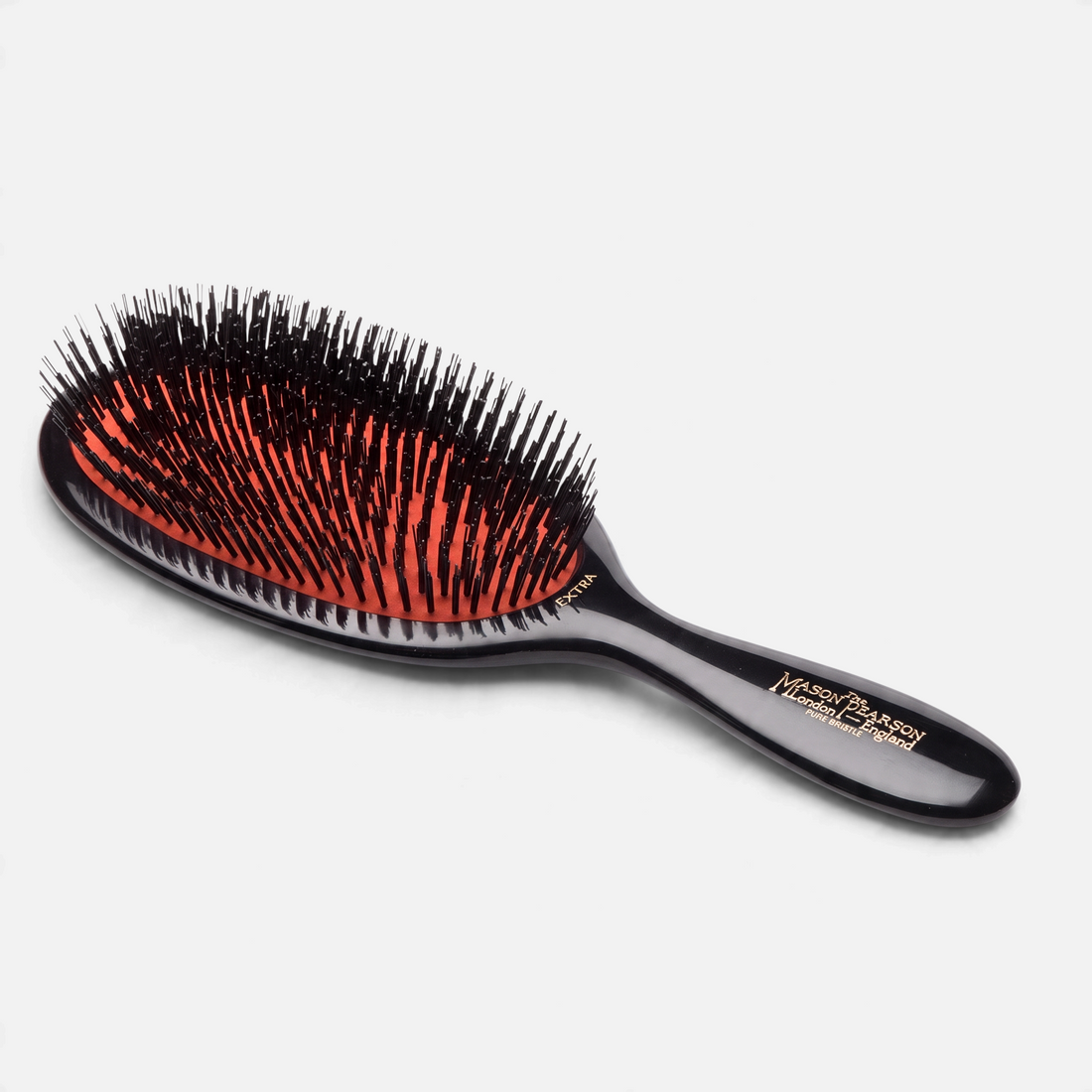 Shop Rescue Spa Mason Pearson Large Extra Pure Bristle B1 hairbrush with black handle and orange pneumatic cushion