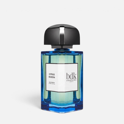 Shop Rescue Spa Citrus Riviera eau de parfum in a rectangular blue glass bottle with a black cap.