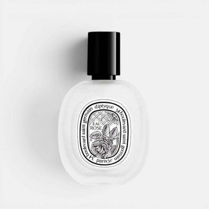Diptyque Eau Rose Hair Mist positioned upright with a white background. Notes of Damascena rose, Centifolia rose, Litchi accord.