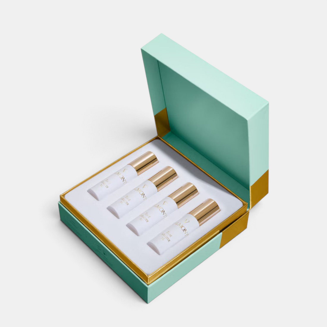 Shop Rescue Spa Valmont Time Master XL four-week anti-aging skincare treatment set in a mint green and gold gift box.