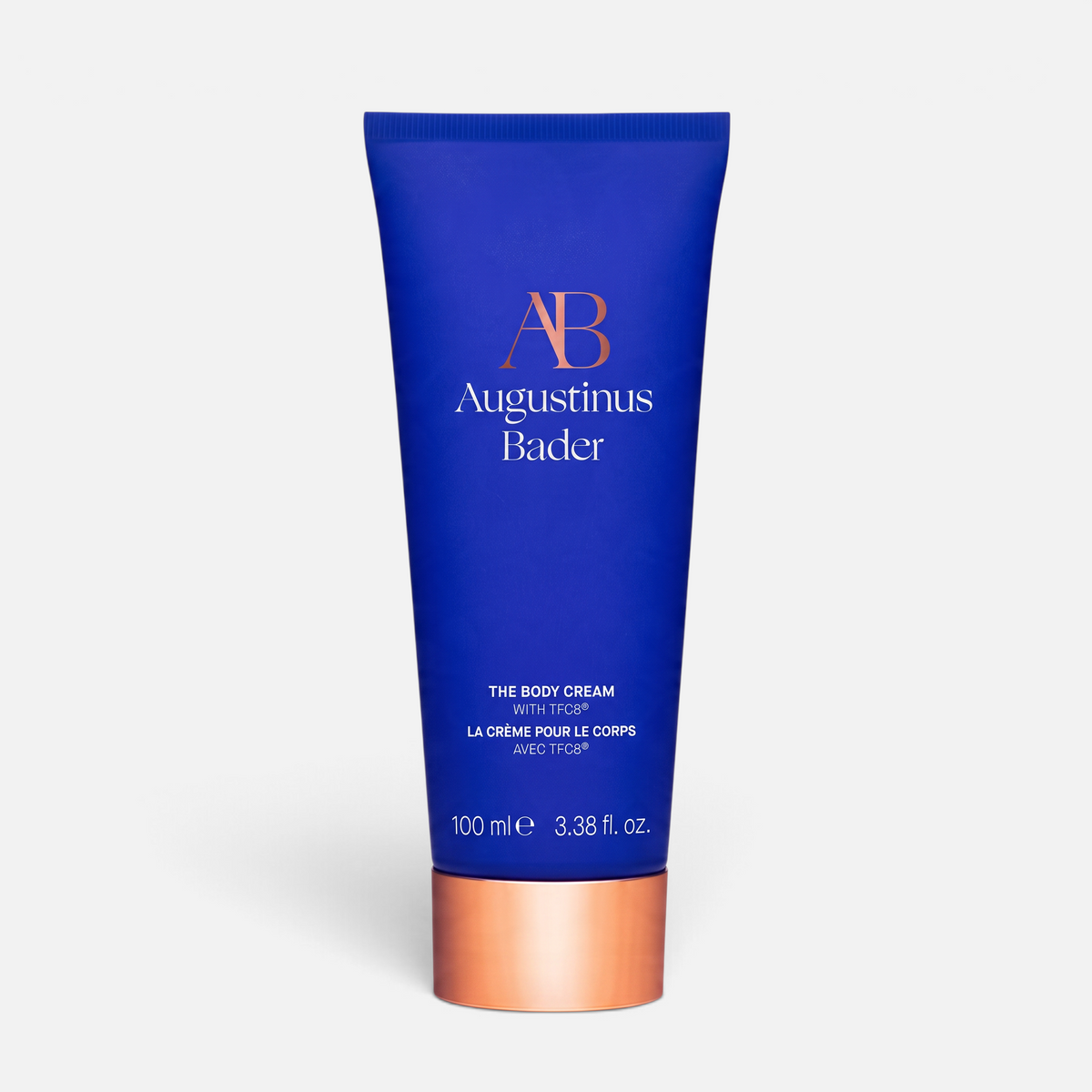 Shop Rescue Spa Augustinus Bader The Body Cream in a blue tube with a metallic copper cap for skin renewal