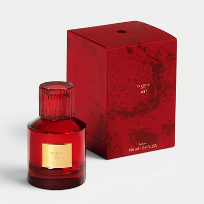 Shop Rescue Spa 45 Degree Parfum in a deep red glass bottle with a gold label next to its matching red gift box.