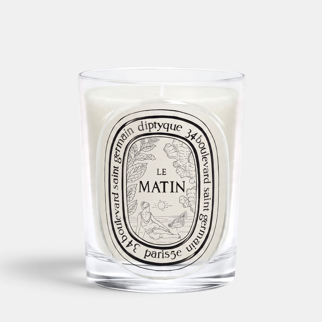 Shop Rescue Spa Diptyque Le Matin candle in a clear glass vessel with an illustrated label featuring mint and ginger.