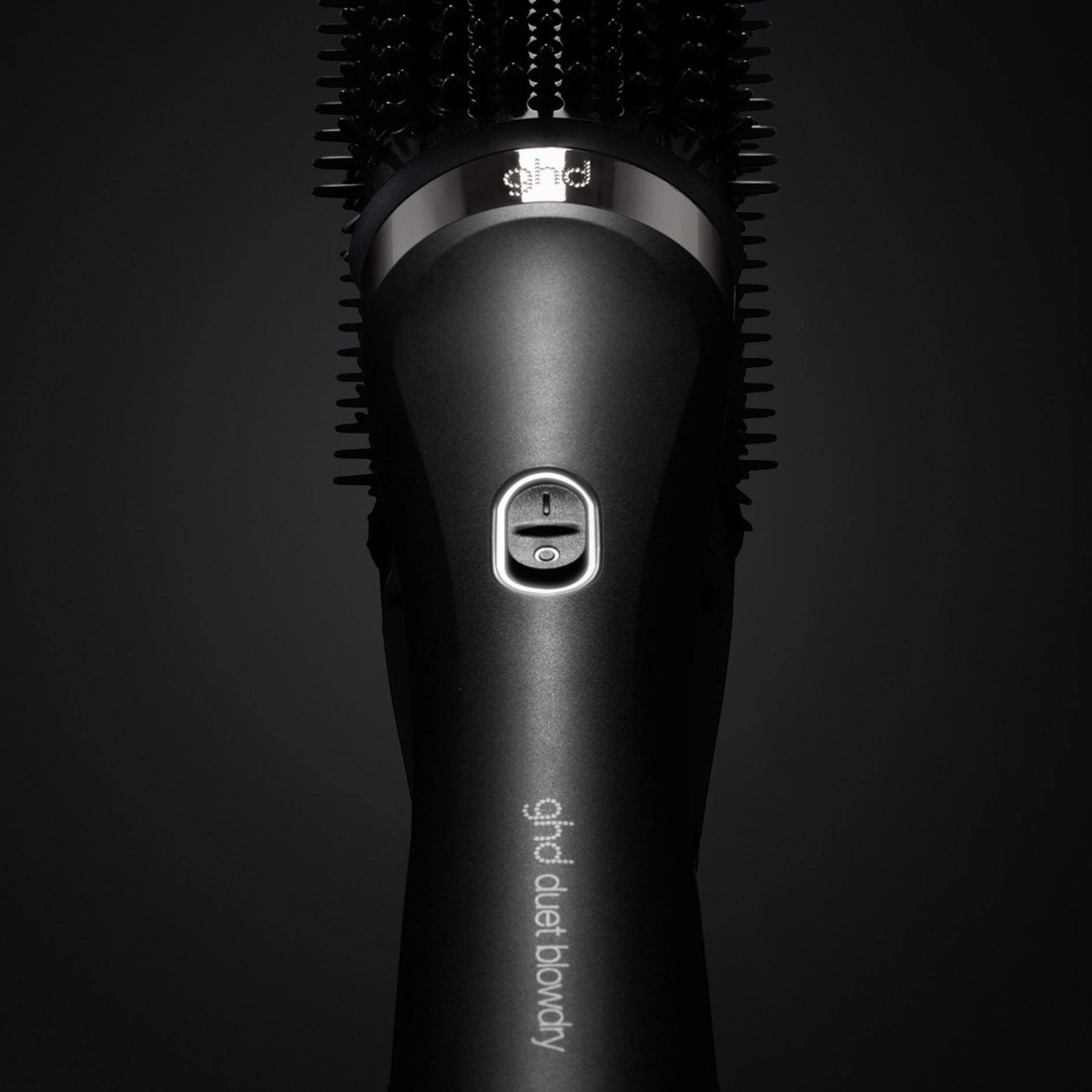 ghd Duet Blowdry hair dryer brush in matte black with snag-free bristles and sleek ergonomic handle.