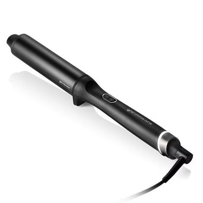 Good Hair Day Chronos Curve Grand curling iron positioned on a 45 degree angle with a white background and a shadow below the iron. For voluminous curls.