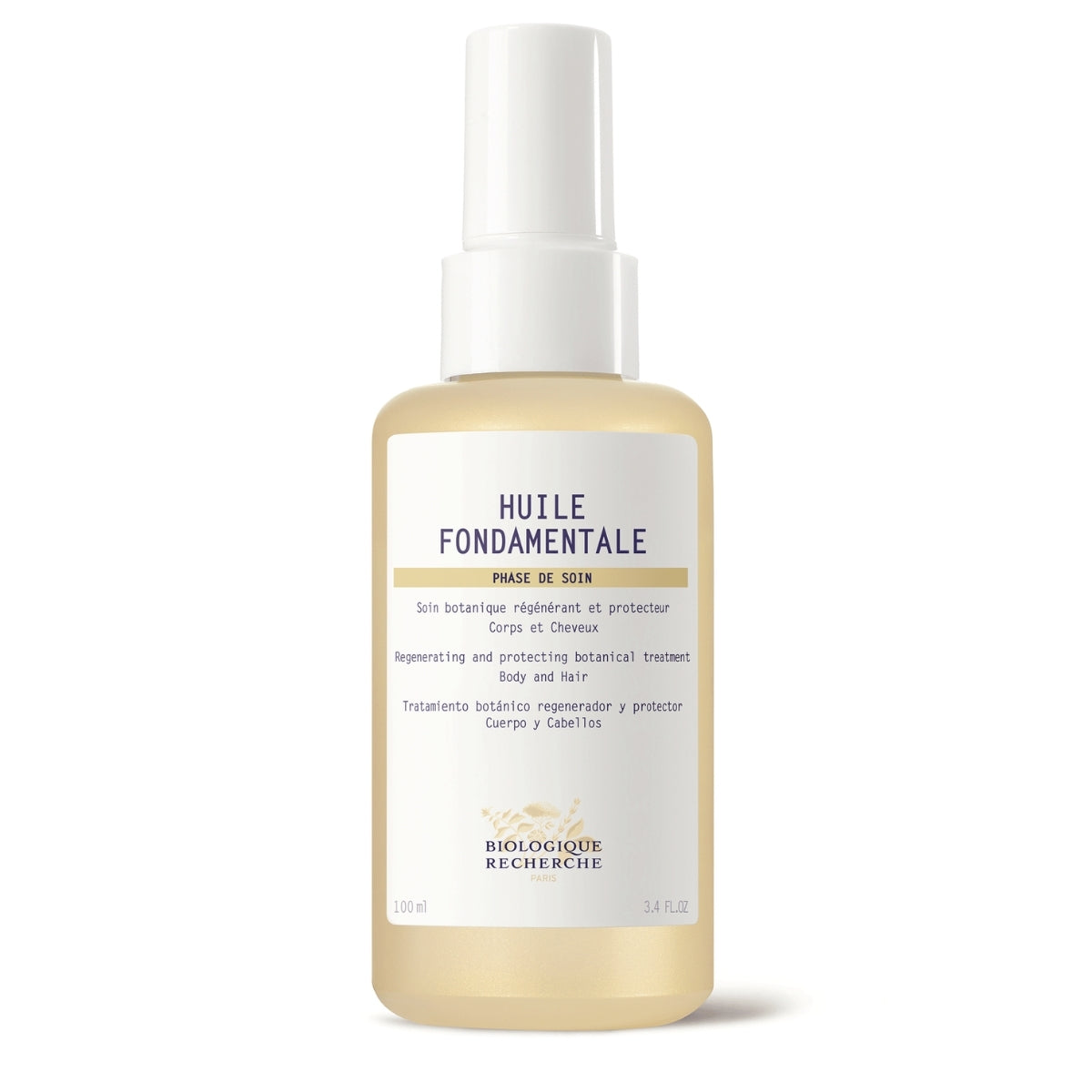 A clear glass bottle of Biologique Recherche Huile Fondamentale with a golden botanical oil inside, featuring a white label and gold cap, photographed on a clean white background.
