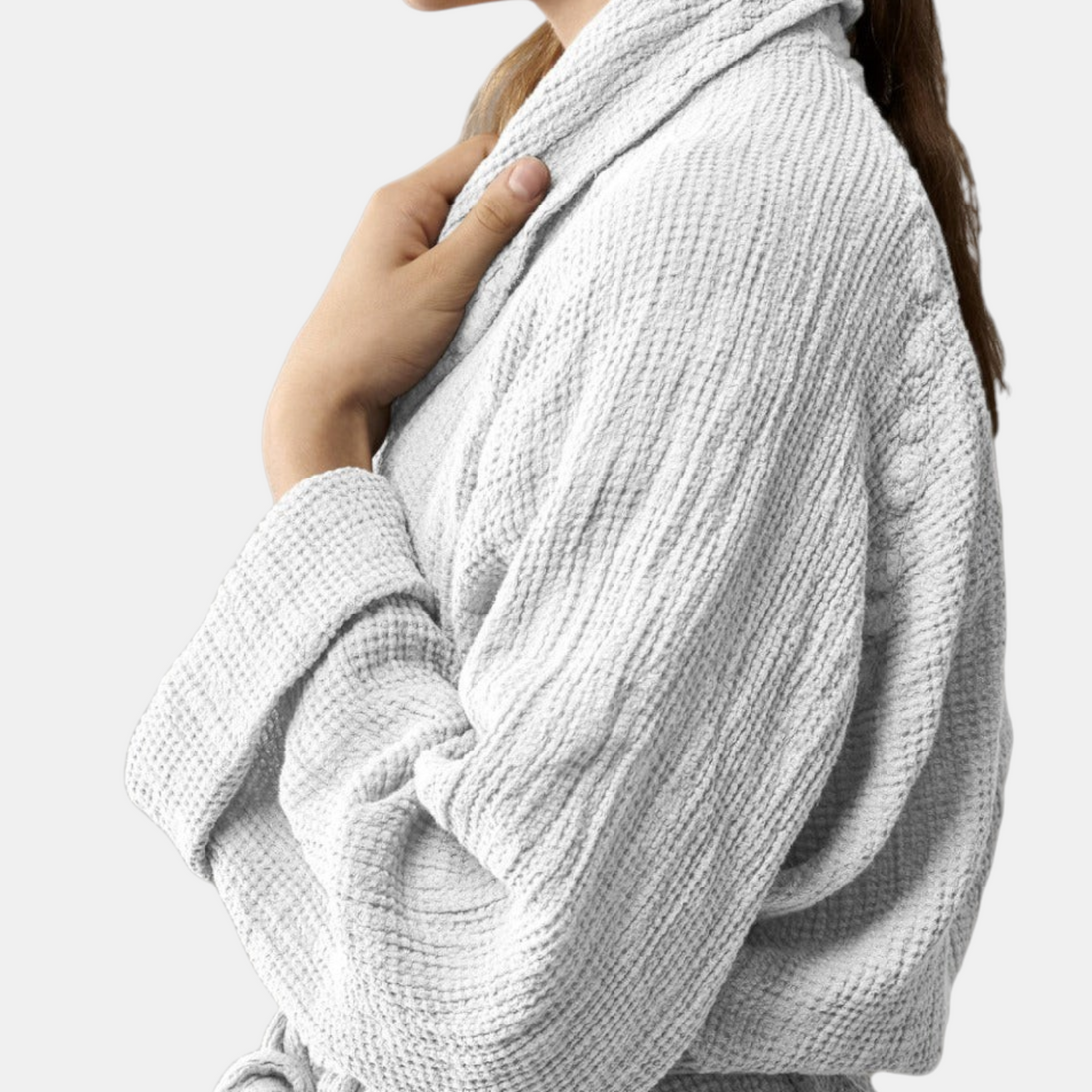 Shop Rescue Spa Lipe white linen waffle weave bathrobe with a shawl collar worn by a woman in a side profile view.