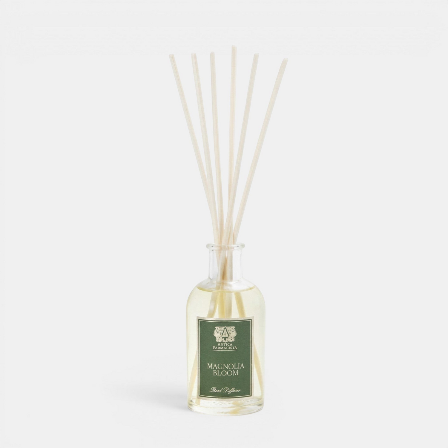 Diffuser with reeds and a label on a white background