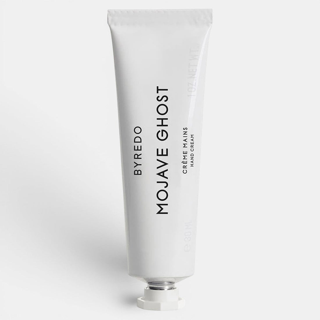 Hand cream tube of Byredo Mojave Ghost on a white background