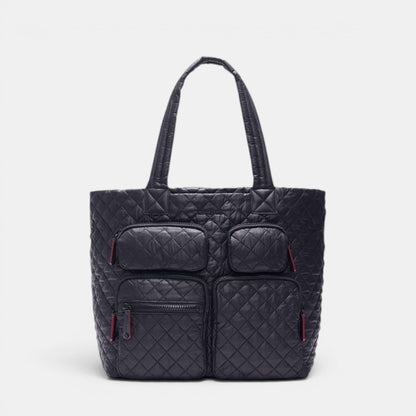 Black quilted tote bag with red accents on a white background
