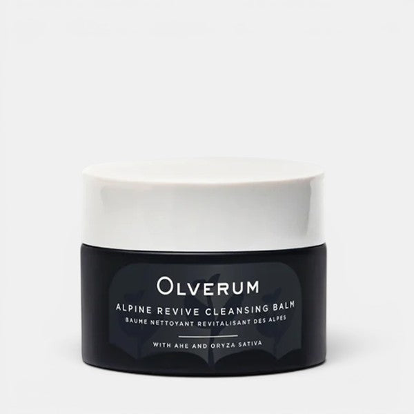 Jar of Olverum Alpine Revive Cleansing Balm on a grey background